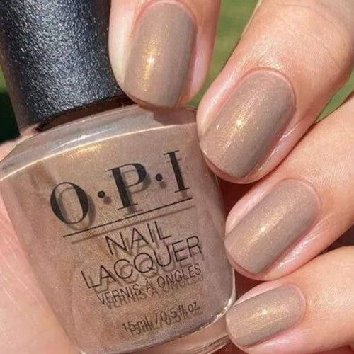 OPI Fall-ing for Milan Neutral/Nude Sandy Brown with Gold Shimmer Nail Polish from the OPI Muse of Milan Collection. OPI Item Product Code NLMI01