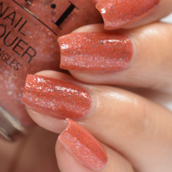 OPI It's A Wonderful Spice Coral Glitter Nail Polish from the OPI Terribly Nice Holiday Collection. OPI Item Product Code HRQ09