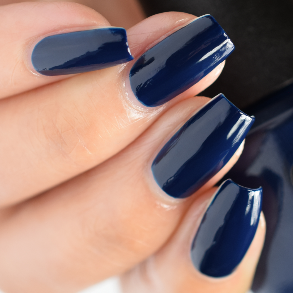 OPI Midnight Mantra Dark Blue Creme Nail Polish from the OPI Fall Wonders Collection. OPI Item Product Code NLF009