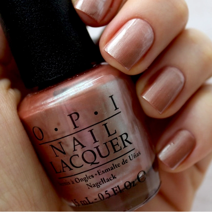 OPI Nomad's Dream Neutral/Nude Brown Nail Polish with a Shimmer Frost/Pearl Finish. OPI Item Product Code NLP02