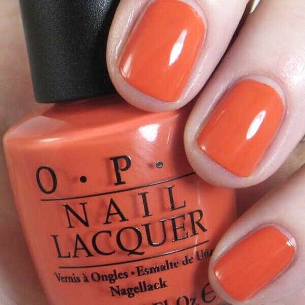 OPI Call Me Gwen-Ever Dusty Orange Creme Nail Polish from the OPI Spider-Man Collection from 2012. OPI Product Code NLM35