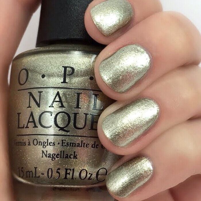 OPI Comet Closer Gold Shimmer Nail Polish from the OPI Starlight Holiday Collection 2015. OPI Item Product Code HRG42