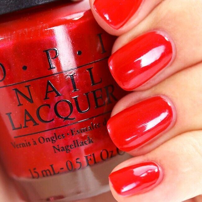 OPI Gimme A Lido Kiss Red Shimmer Nail Polish from the OPI Venice Collection. OPI Item Product Code NLV30