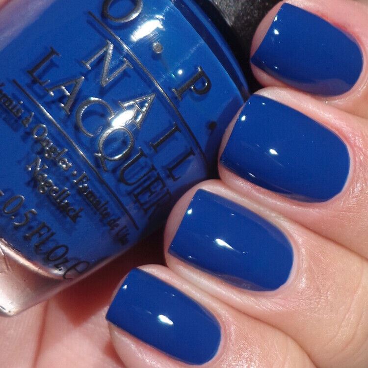 OPI Keeping Suzi At Bay Blue Creme Nail Polish. OPI Item Product Code NLF57