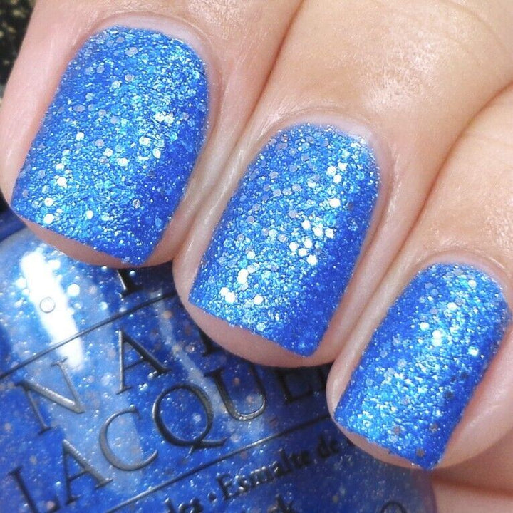 OPI Kiss Me At Midnight Blue Glitter Liquid Sand Nail Polish from the OPI Mariah Carey Collection. OPI Product Code HLE22