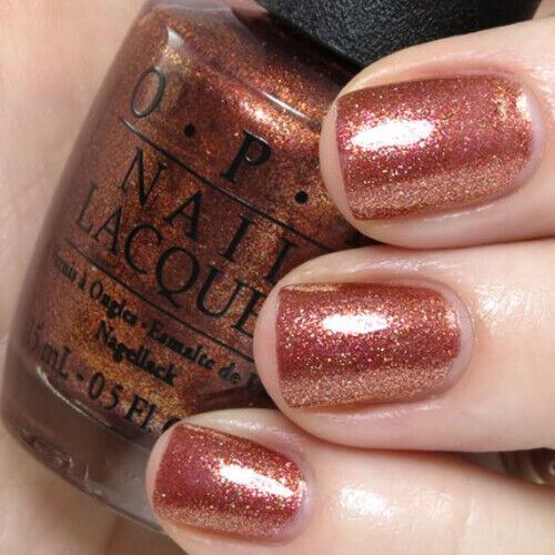 OPI Sprung Copper Bronze Shimmer Nail Polish from the OPI x Mariah Carey Collection. OPI Product Code NLM42