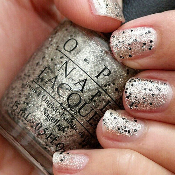 OPI Wonderous Star Gold and Black Glitter Nail Polish from the OPI x Mariah Carey Collection. OPI Product Code HLE12