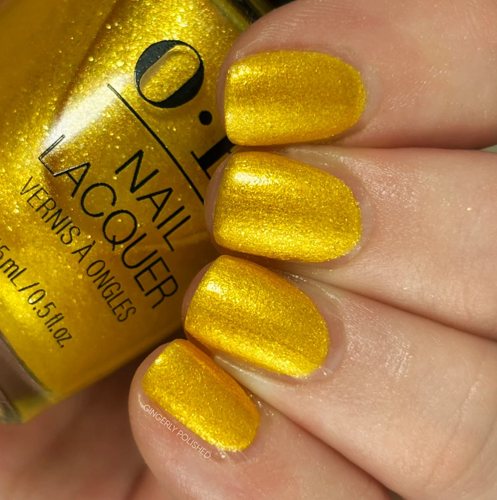 OPI I Love You So Munchkin Yellow Gold Shimmer from the OPI x Wicked Limited Edition Nail Polish Collection. OPI Item Product Code HRR12
