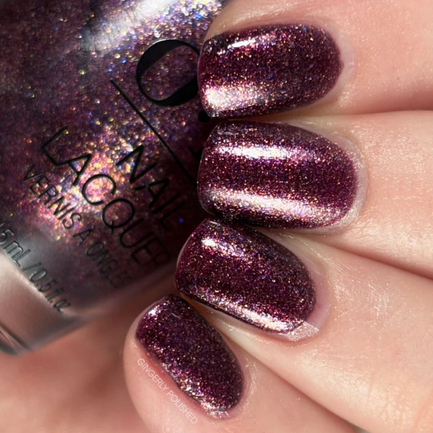 OPI Let's Rejoicify Plum Purple Shimmer Nail Polish from the OPI x Wicked Collaboration. OPI Item Product Code HRR03