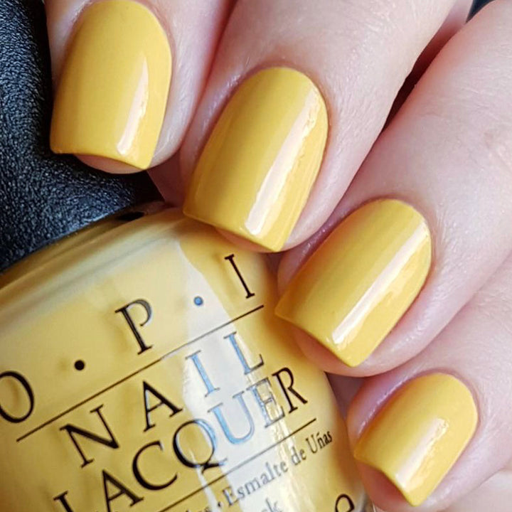 OPI Never a Dulles Moment Yellow Creme Nail Polish from the OPI Washington DC Collection from 2016. OPI Item Product Code NLW56