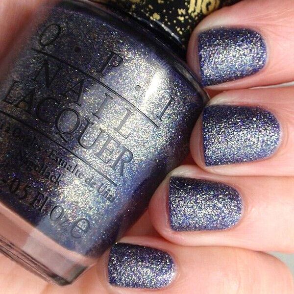 OPI Alcatraz Rocks Liquid Sand Nail Polish with Blue and Multicoloured Glitter. OPI Item Product Code NLF67