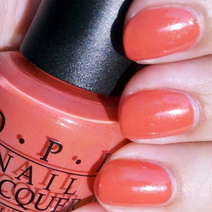 OPI Are We There Yet? Coral Orange Shimmer Nail Polish from the OPI Touring America Collection. OPI Product Code NLT23