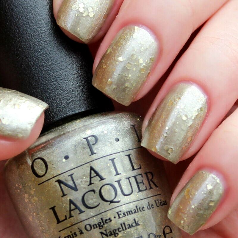 OPI Baroque... But Still Shopping! Soft Gold Glitter Nail Polish from the OPI Venice Collection from 2015. OPI Item Product Code NLV38