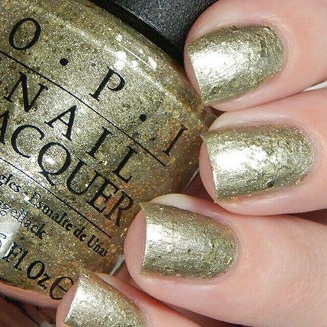 OPI Baroque... But Still Shopping! Soft Gold Glitter Nail Polish from the OPI Venice Collection from 2015. OPI Item Product Code NLV38
