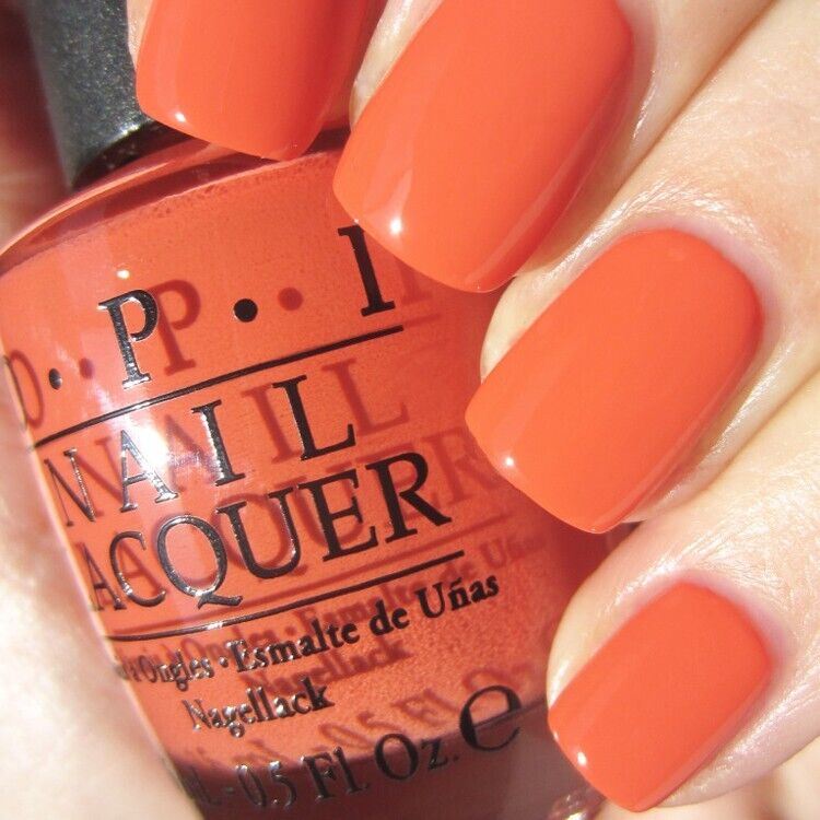 OPI Call Me Gwen-Ever Dusty Orange Creme Nail Polish from the OPI Spider-Man Collection from 2012. OPI Product Code NLM35
