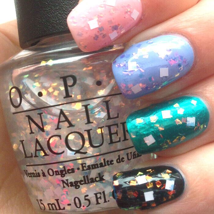 OPI Lights Of Emerald City Iridescent Glitter Nail Polish Top Coat from the Oz The Great and Powerful Collection. OPI Item Product Code NLT56