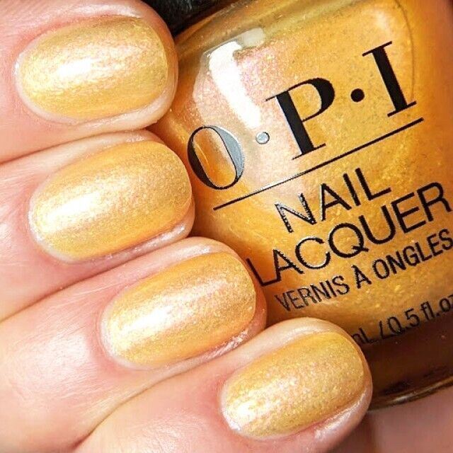 OPI Magic Hour Orange Yellow Shimmer Nail Polish from the OPI Hidden Prism Collection