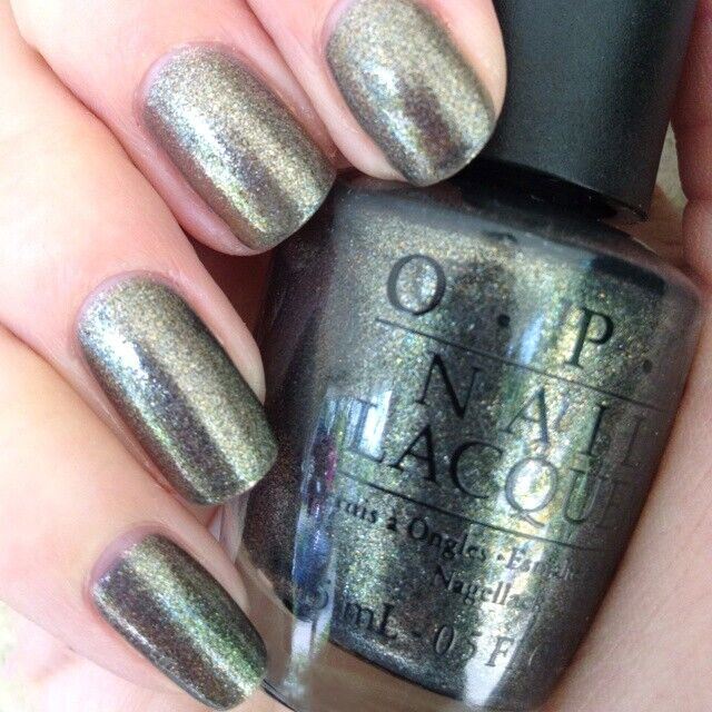 OPI Number One Nemesis Green Grey Shimmer Nail Polish from the OPI Spider-Man Collection. OPI Item Product Code NLM38
