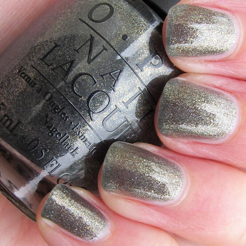OPI Number One Nemesis Green Grey Shimmer Nail Polish from the OPI Spider-Man Collection. OPI Item Product Code NLM38