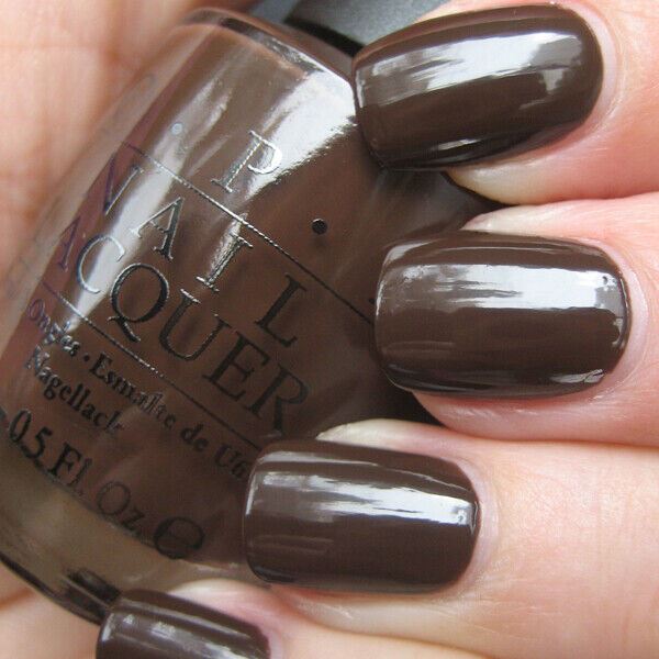 OPI Suzi Loves Cowboys Dark Brown Creme Nail Polish from the OPI Texas Collection. OPI Item Product Code NLT12