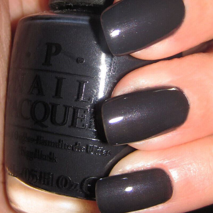 OPI Suzi Skis In The Pyrenees Dark Blue Grey Nail Polish from the OPI Espana/Spain Collection. OPI Item Product Code NLE47